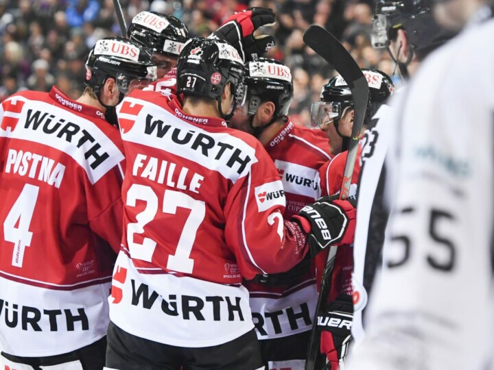 Team Canada`s Paul Postma, left, and team celebrate after scoring 2-0 during the game between Team Canada and TPS Turku, at the 93th Spengler Cup ice hockey tournament in Davos, Switzerland, Monday, December 30, 2019. (KEYSTONE/Gian Ehrenzeller)